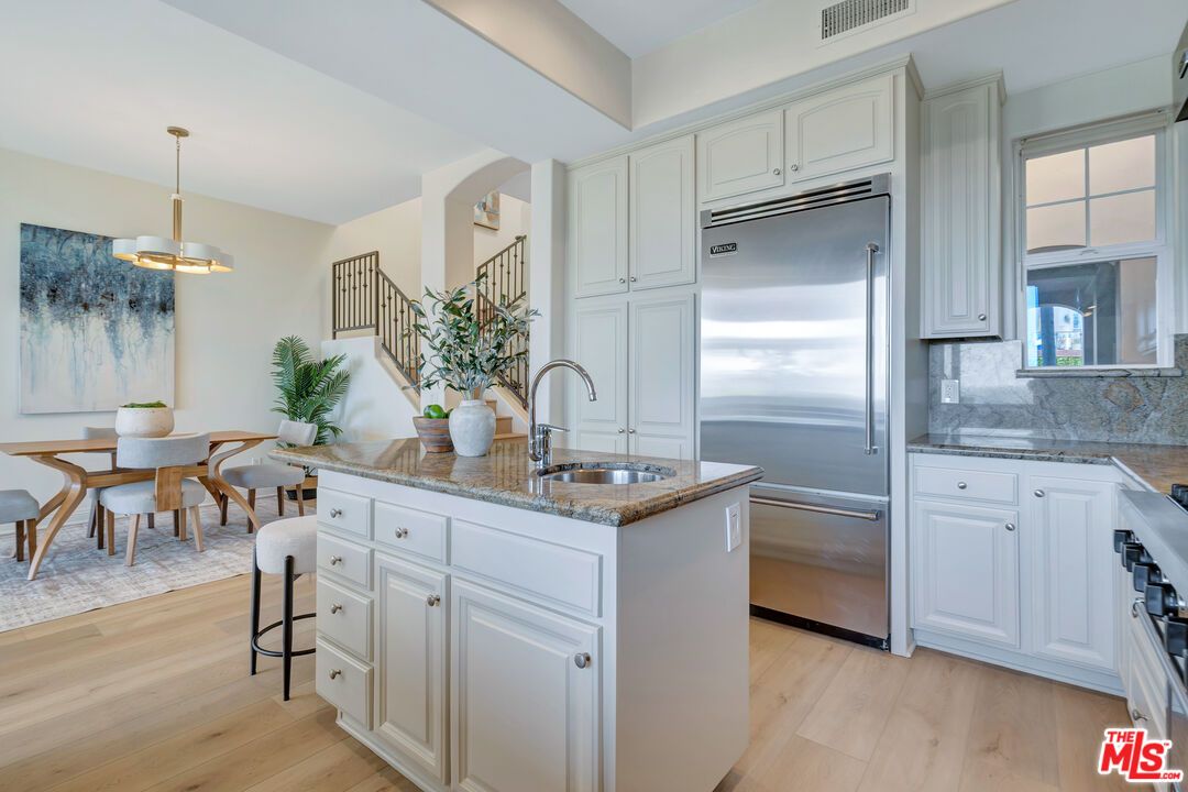Dining room, Interior, Kitchen, Pendant Lights, Stainless Steel Appliances, Wood Texture Flooring
