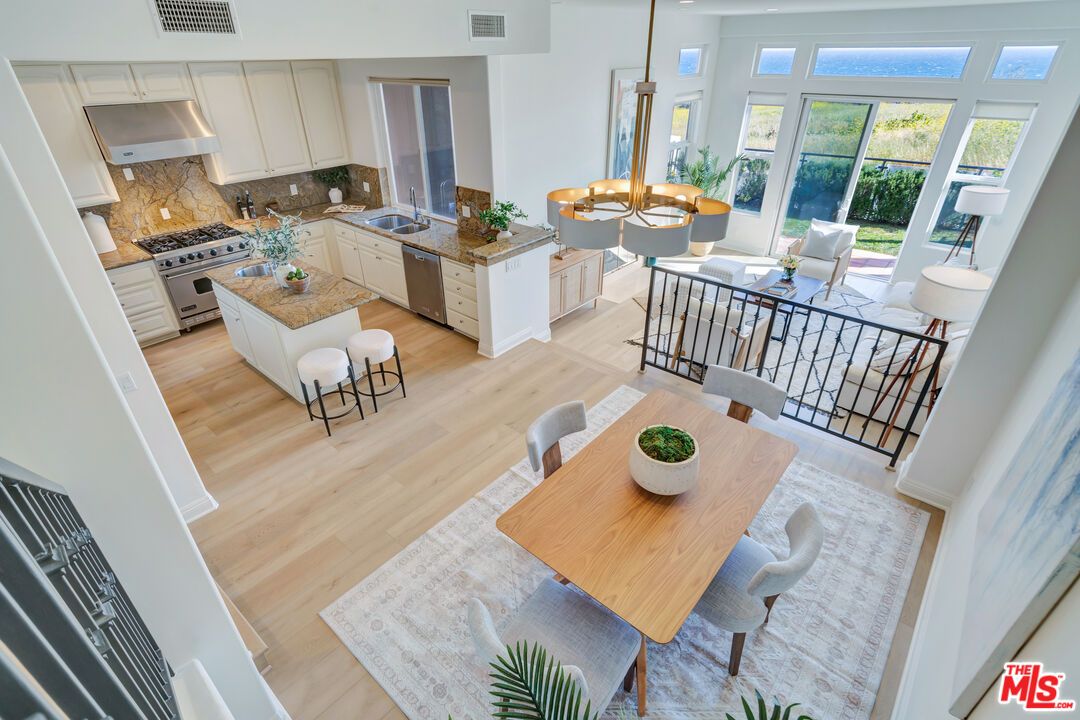 Dining room, Interior, Kitchen, Living room, Pendant Lights, Stainless Steel Appliances, Wood Texture Flooring
