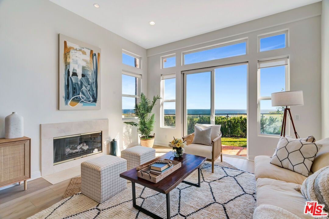 Fireplace, Interior, Living room, Recessed Lighting, Water, Wood Texture Flooring