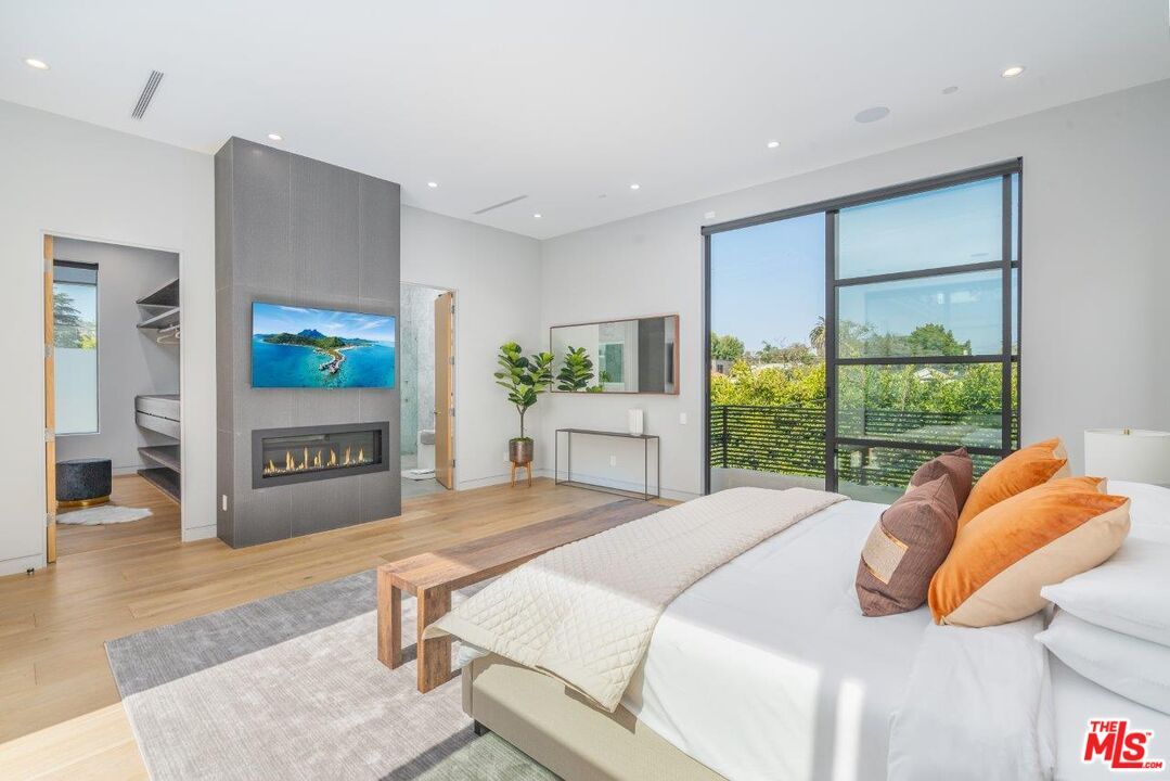 Bedroom, Fireplace, Interior, Recessed Lighting, Wood Texture Flooring