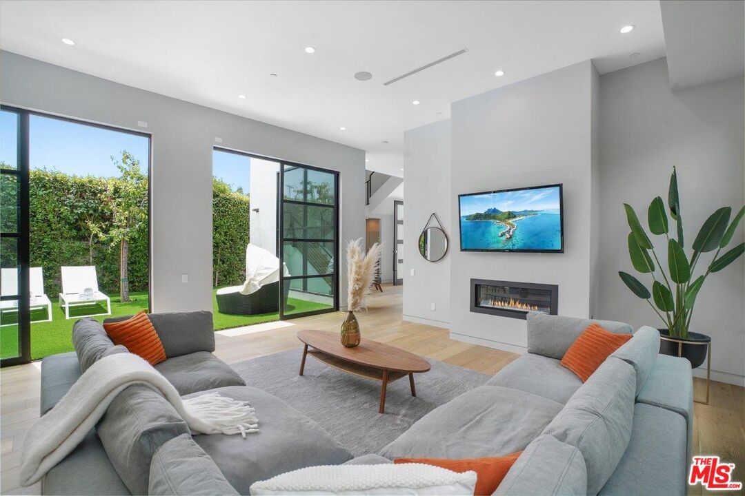 Fireplace, Interior, Living room, Recessed Lighting, Wood Texture Flooring