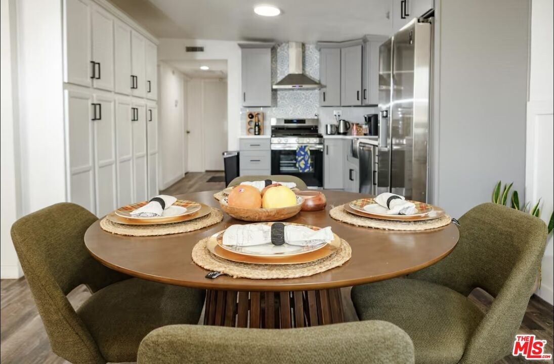 Dining room, Interior, Kitchen, Recessed Lighting, Stainless Steel Appliances, Wood Texture Flooring