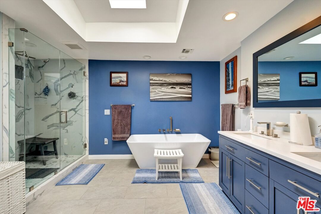 Bathroom, Dual Sink Vanities, Free Standing Baths, Glass Shower, Interior, Marble Walls, Recessed Lighting