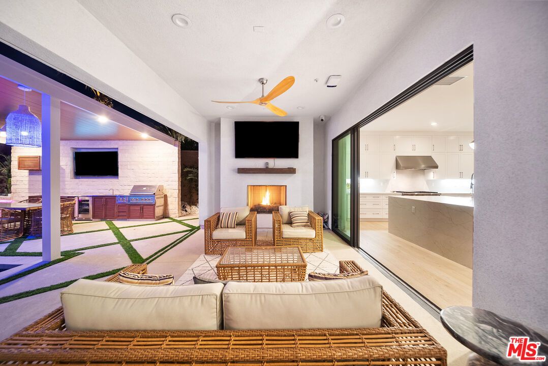 Fireplace, Interior, Kitchen, Living room, Recessed Lighting, Stone Walls, Wood Texture Flooring