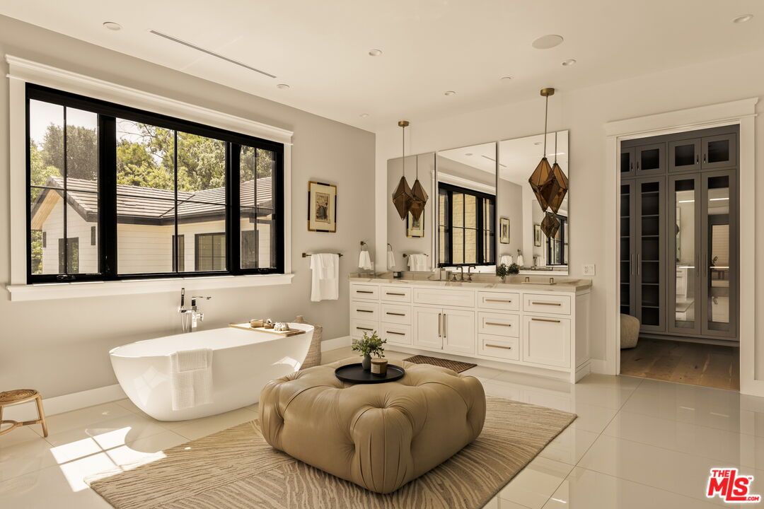 Bathroom, Dual Sink Vanities, Free Standing Baths, Interior, Pendant Lights, Recessed Lighting, Wood Texture Flooring