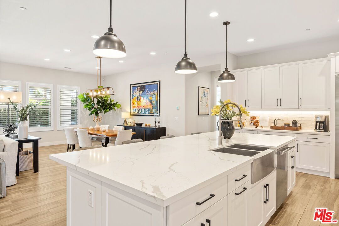 Dining room, Interior, Kitchen, Pendant Lights, Recessed Lighting, Stainless Steel Appliances, Wood Texture Flooring