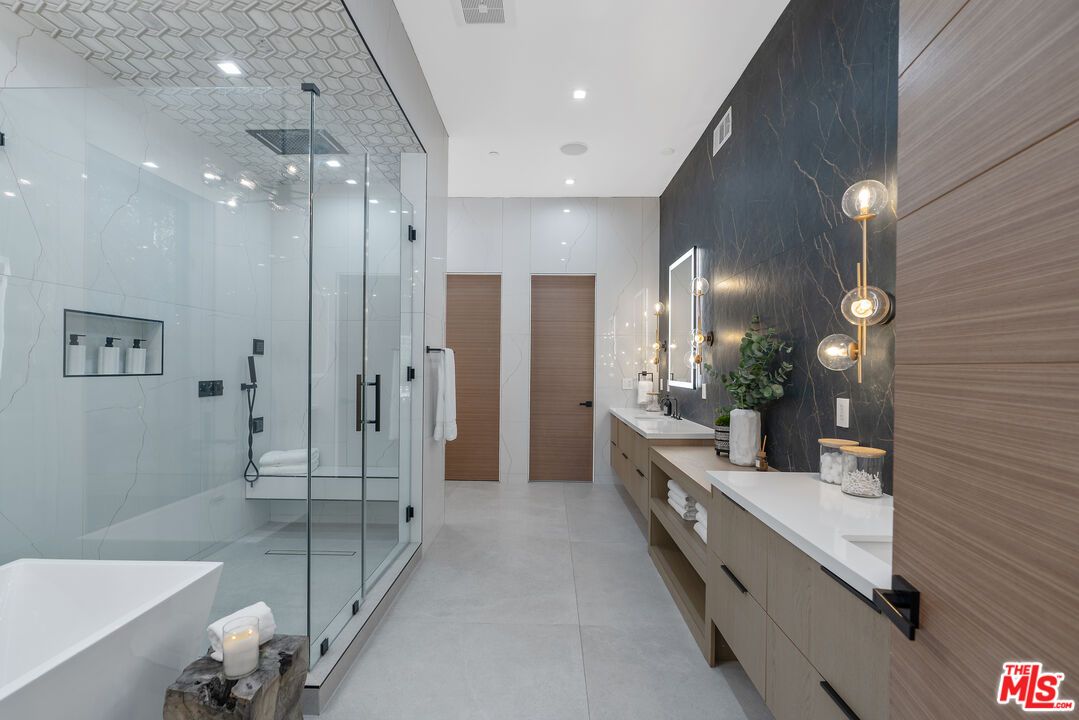 Bathroom, Dual Sink Vanities, Glass Shower, Interior, Marble Walls, Recessed Lighting