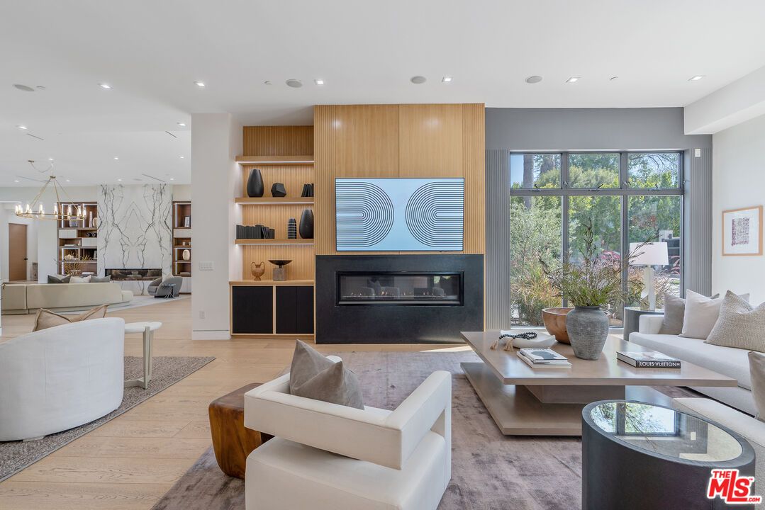 Fireplace, Interior, Living room, Marble Walls, Pendant Lights, Recessed Lighting, Wood Texture Flooring