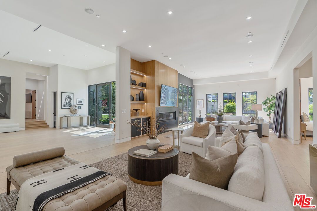 Dining room, Fireplace, Interior, Living room, Recessed Lighting, Wood Texture Flooring, Wooden Walls