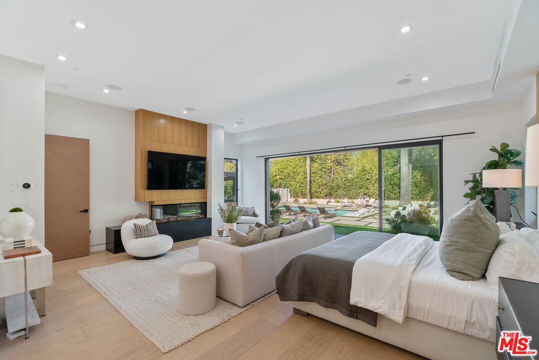 Bedroom, Fireplace, Interior, Recessed Lighting, Wood Texture Flooring