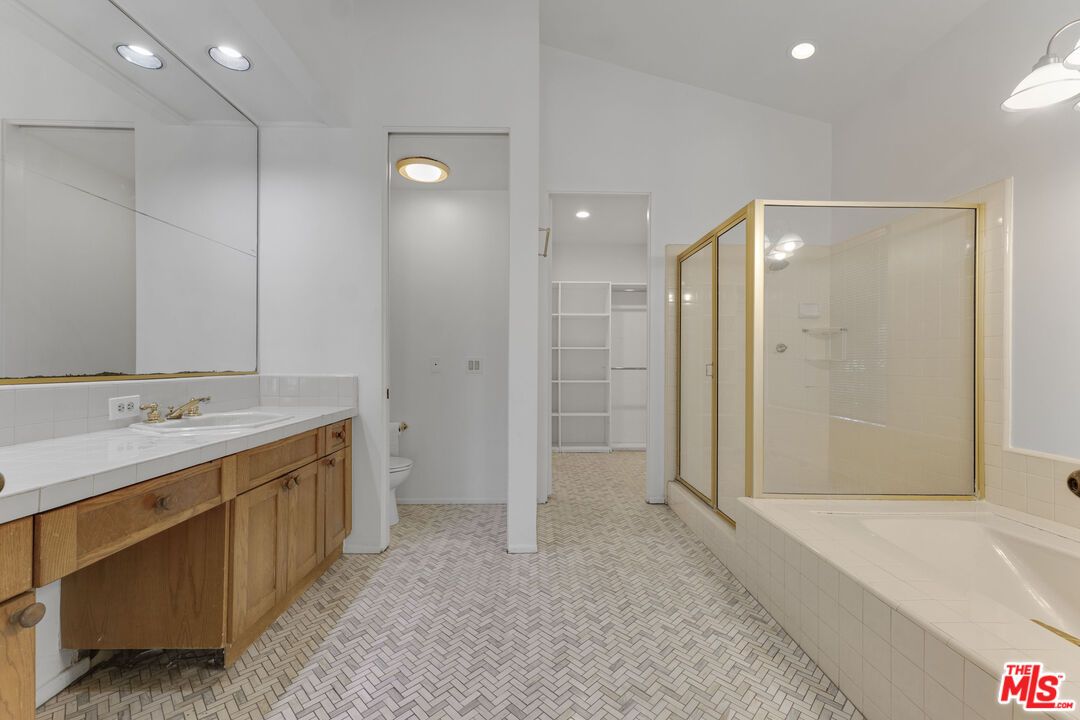 Bathroom, Dual Sink Vanities, Glass Shower, Interior, Recessed Lighting, Tile Countertops