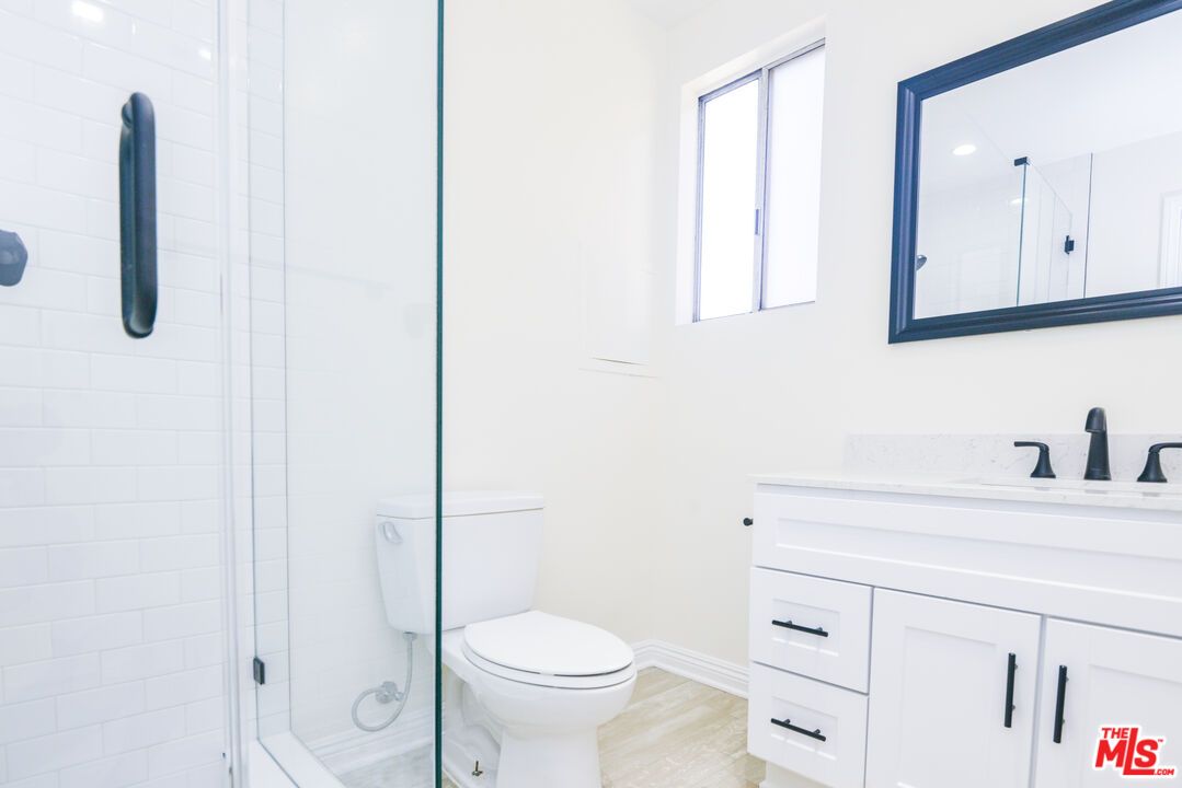 Bathroom, Glass Shower, Interior, Recessed Lighting, Wood Texture Flooring