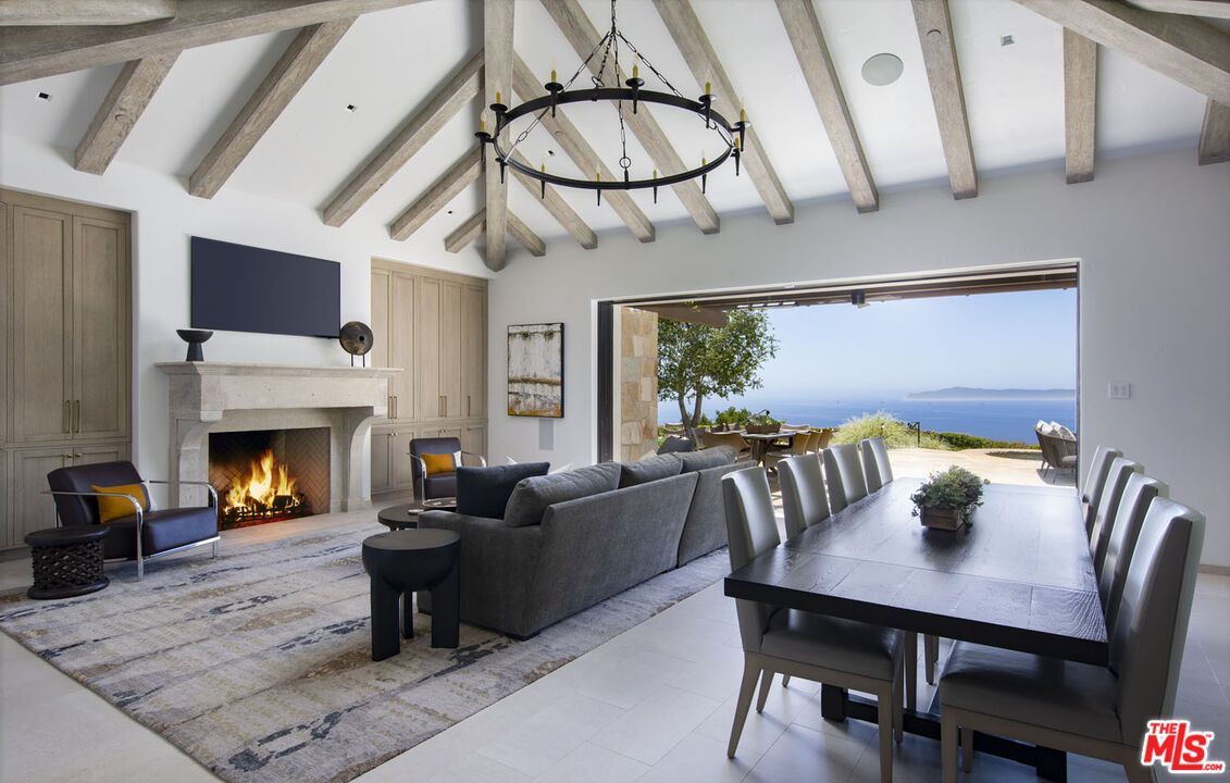Chandelier, Dining room, Fireplace, Interior, Living room, Pendant Lights, Water, Wooden Beams
