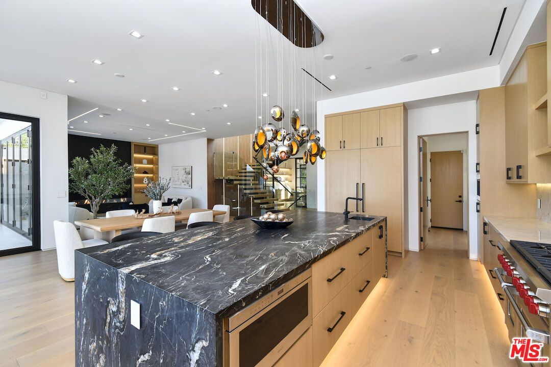Dining room, Interior, Kitchen, Pendant Lights, Recessed Lighting, Stainless Steel Appliances, Wood Texture Flooring