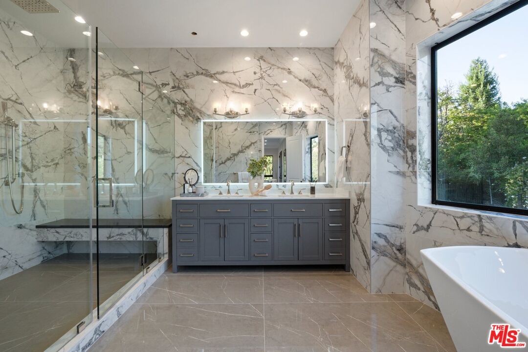 Bathroom, Dual Sink Vanities, Free Standing Baths, Glass Shower, Interior, Marble, Marble Walls, Recessed Lighting