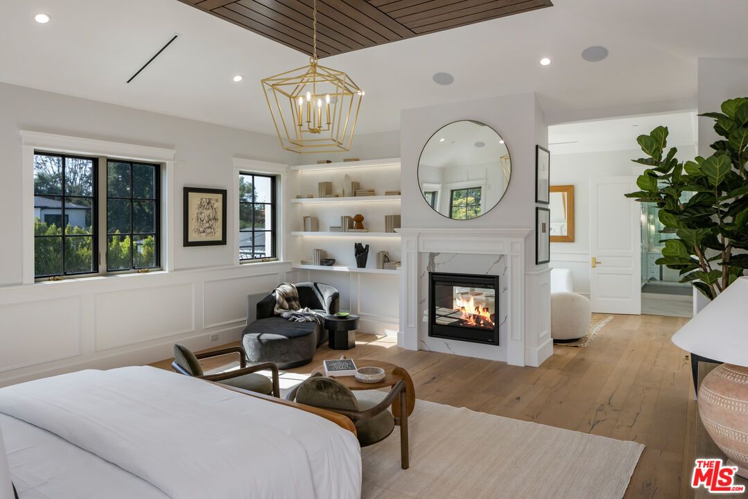 Bedroom, Fireplace, Interior, Living room, Pendant Lights, Recessed Lighting, Wood Texture Flooring