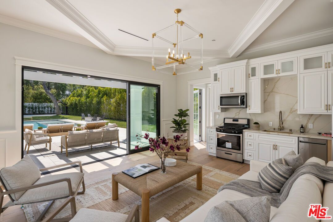 Interior, Kitchen, Living room, Marble Walls, Pendant Lights, Stainless Steel Appliances, Wood Texture Flooring