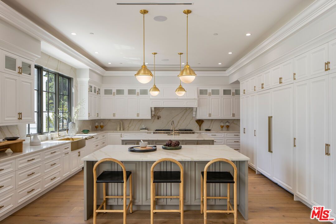 Interior, Kitchen, Marble Walls, Pendant Lights, Recessed Lighting, Stainless Steel Appliances, Wood Texture Flooring