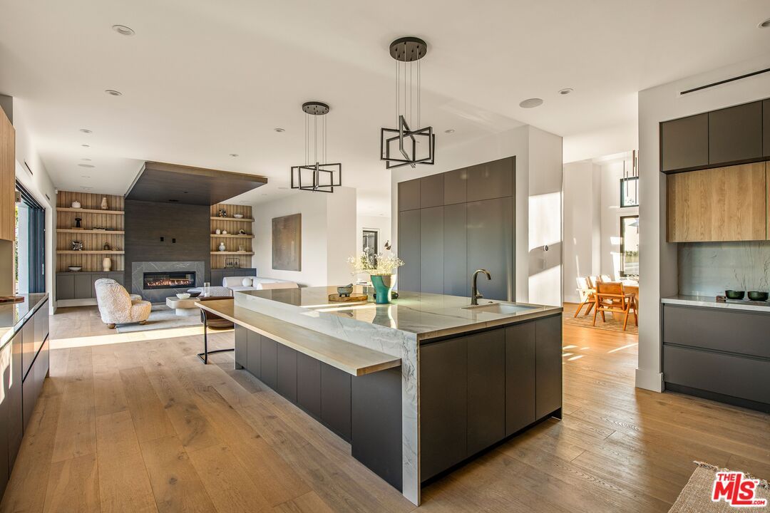 Dining room, Fireplace, Interior, Kitchen, Living room, Pendant Lights, Recessed Lighting, Wood Texture Flooring