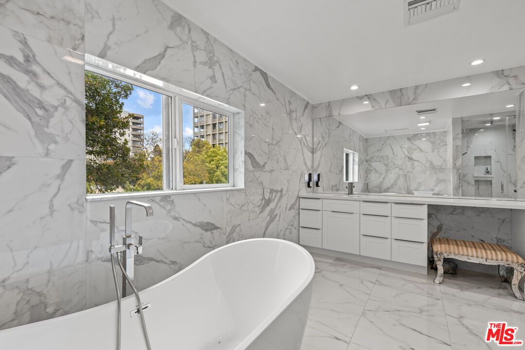 Bathroom, Dual Sink Vanities, Free Standing Baths, Interior, Marble, Marble Walls, Recessed Lighting