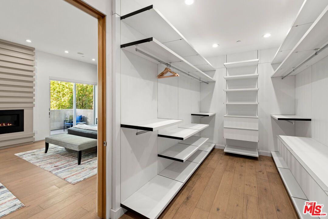 Fireplace, Interior, Recessed Lighting, Walk-in Closets, Wood Texture Flooring