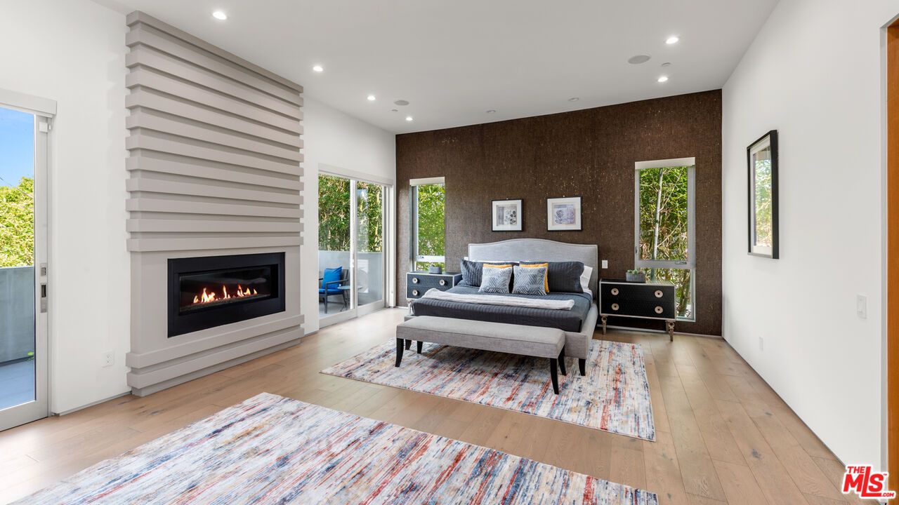 Bedroom, Fireplace, Interior, Recessed Lighting, Wood Texture Flooring