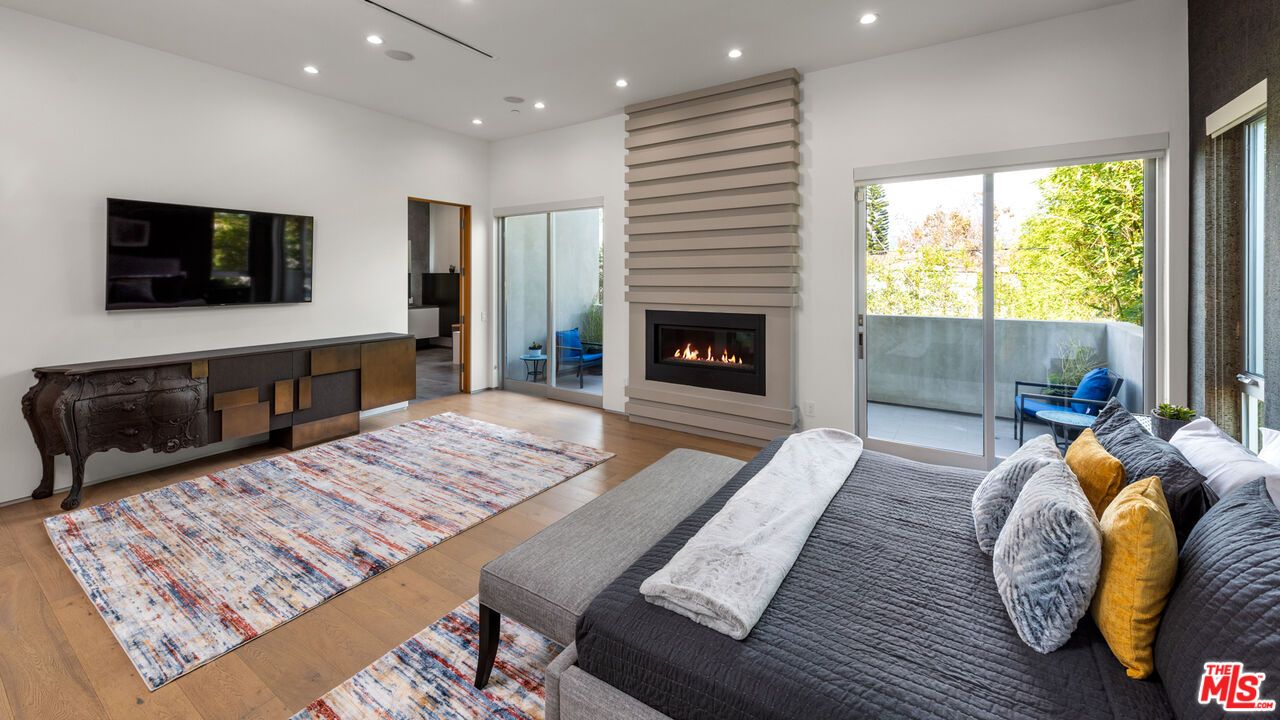 Bedroom, Fireplace, Interior, Recessed Lighting, Wood Texture Flooring
