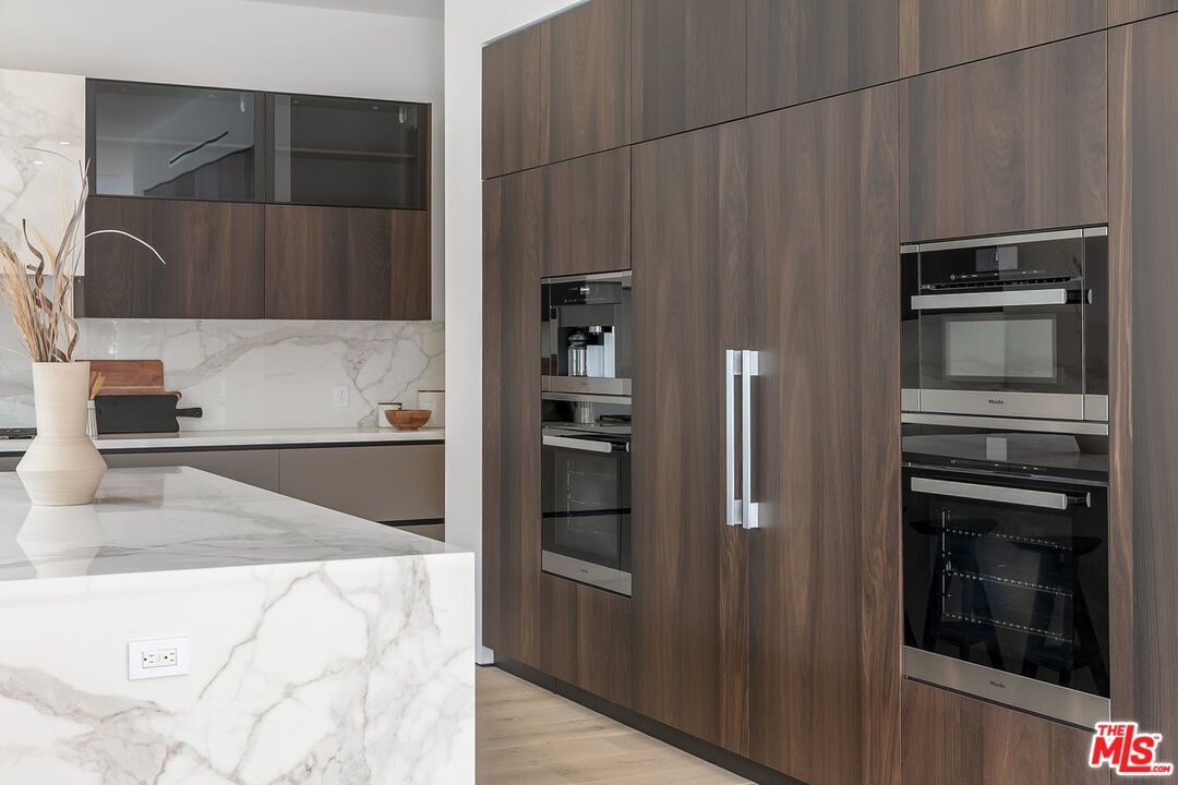 Interior, Kitchen, Marble Walls, Stainless Steel Appliances, Wood Texture Flooring