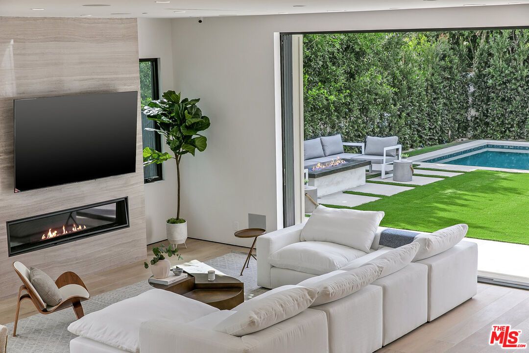 Fireplace, Interior, Living room, Pool, Recessed Lighting, Wood Texture Flooring