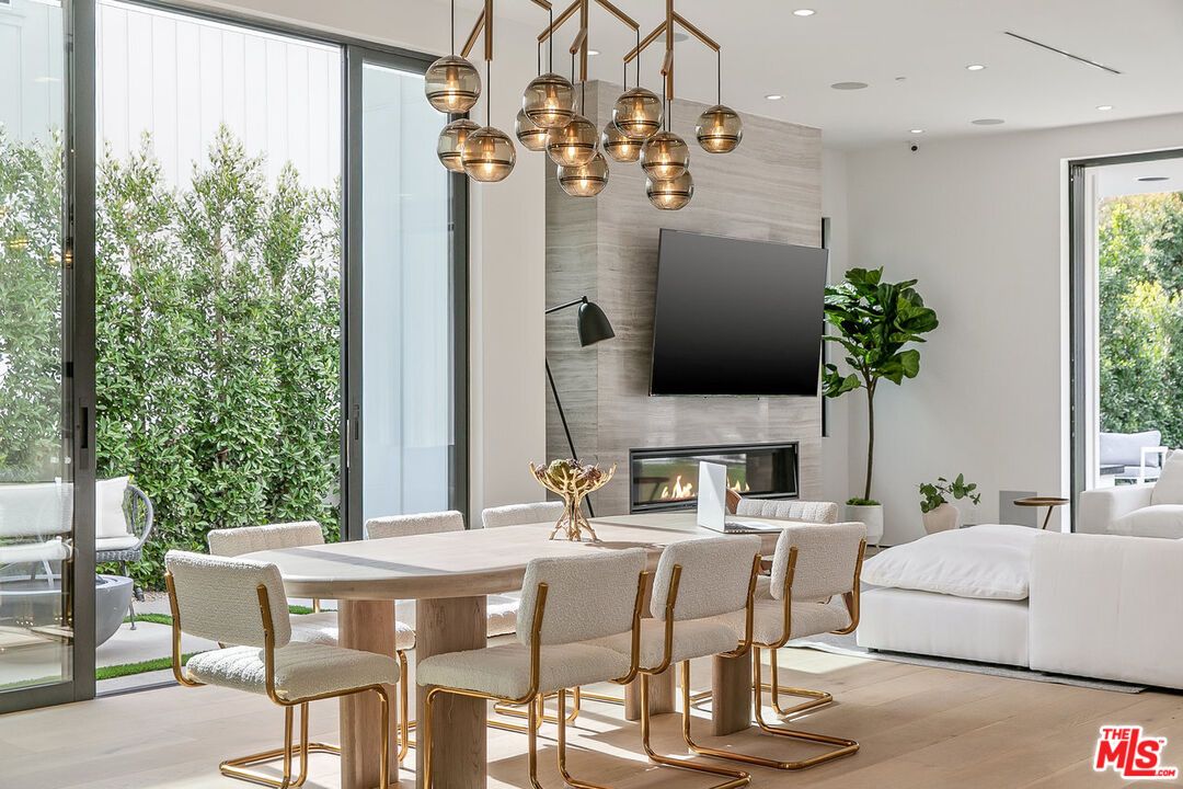 Dining room, Fireplace, Interior, Living room, Pendant Lights, Recessed Lighting, Wood Texture Flooring