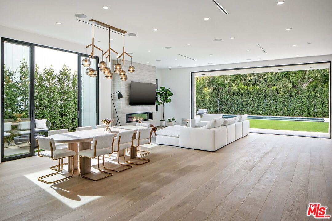 Dining room, Fireplace, Interior, Living room, Pendant Lights, Recessed Lighting, Wood Texture Flooring