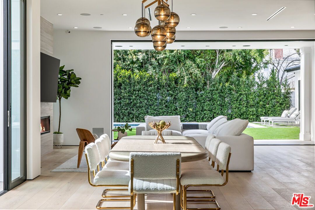 Dining room, Fireplace, Interior, Pendant Lights, Recessed Lighting, Wood Texture Flooring