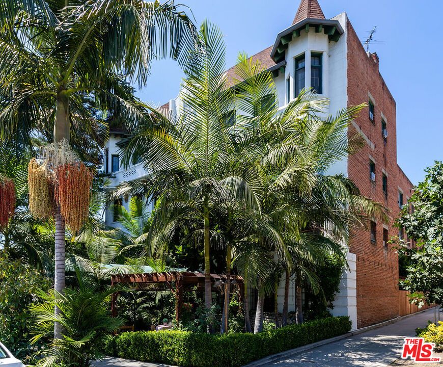 Exterior, Facade, Brick Facade, Condo Building