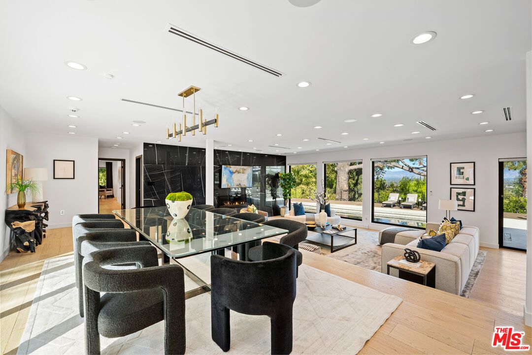 Dining room, Fireplace, Interior, Living room, Pendant Lights, Recessed Lighting, Wood Texture Flooring