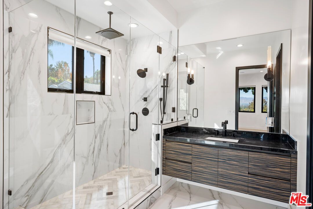Bathroom, Dual Sink Vanities, Glass Shower, Interior, Marble, Marble Walls, Recessed Lighting