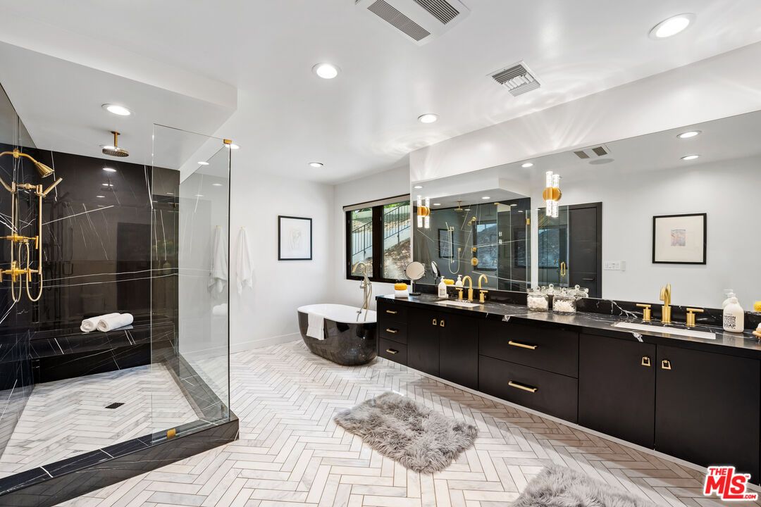 Bathroom, Dual Sink Vanities, Free Standing Baths, Glass Shower, Interior, Marble, Marble Walls, Recessed Lighting