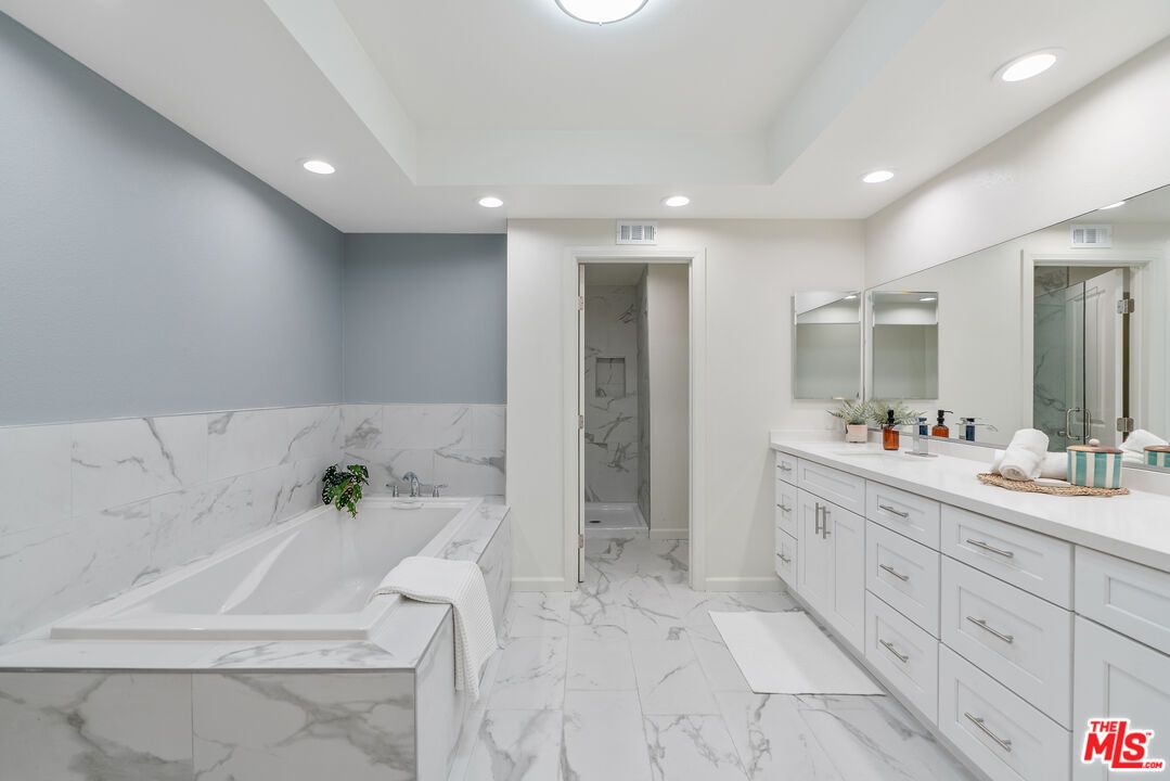Bathroom, Dual Sink Vanities, Interior, Marble, Marble Walls, Recessed Lighting
