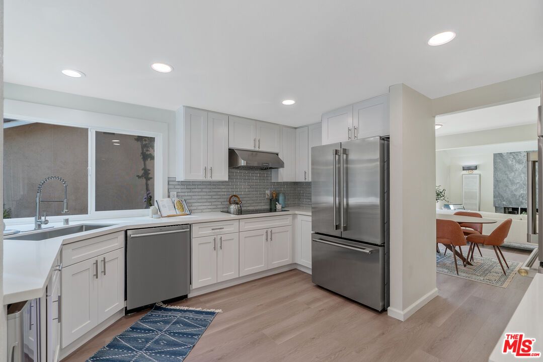 Dining room, Interior, Kitchen, Recessed Lighting, Stainless Steel Appliances, Wood Texture Flooring