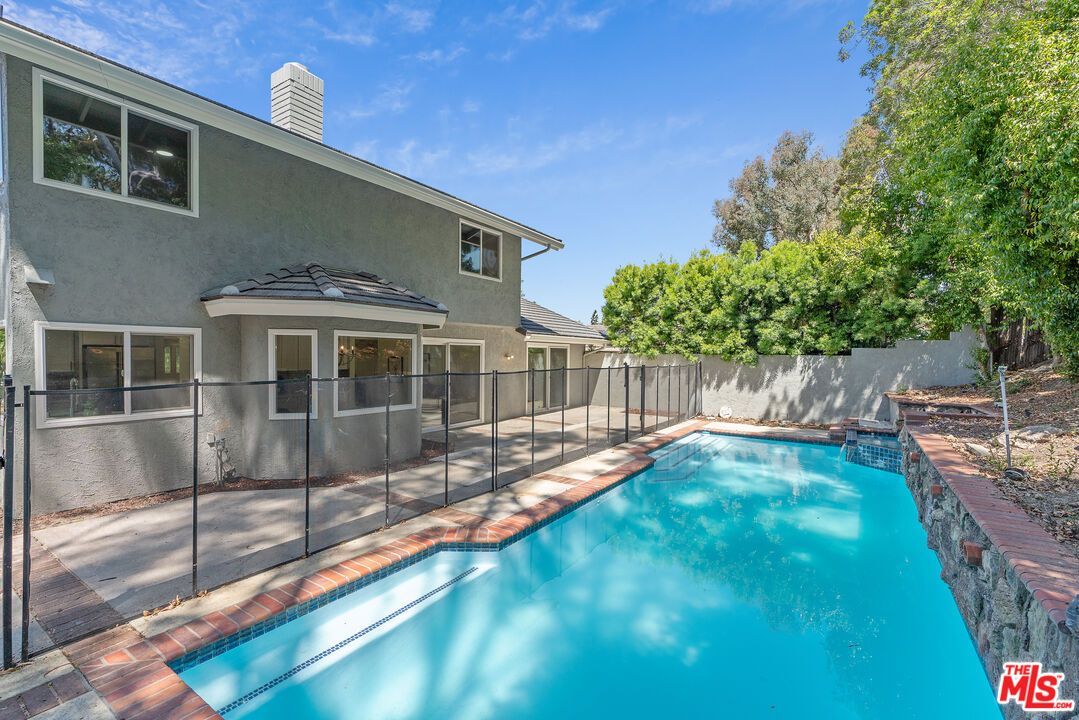 Exterior, Pool, Solar Panels