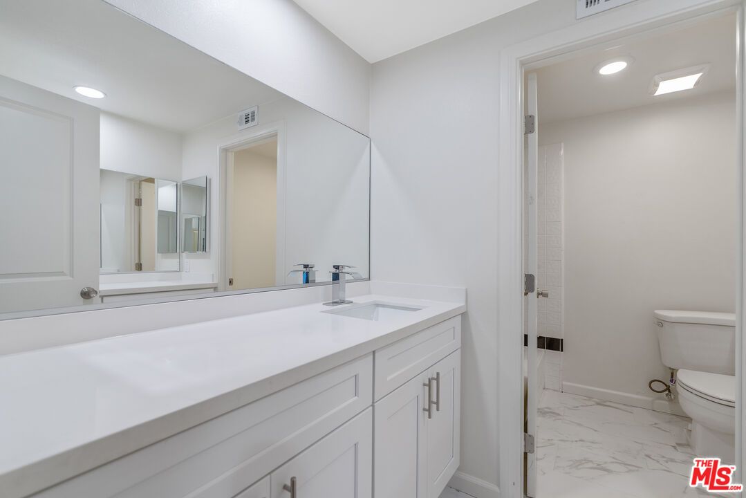 Bathroom, Dual Sink Vanities, Interior, Marble, Recessed Lighting