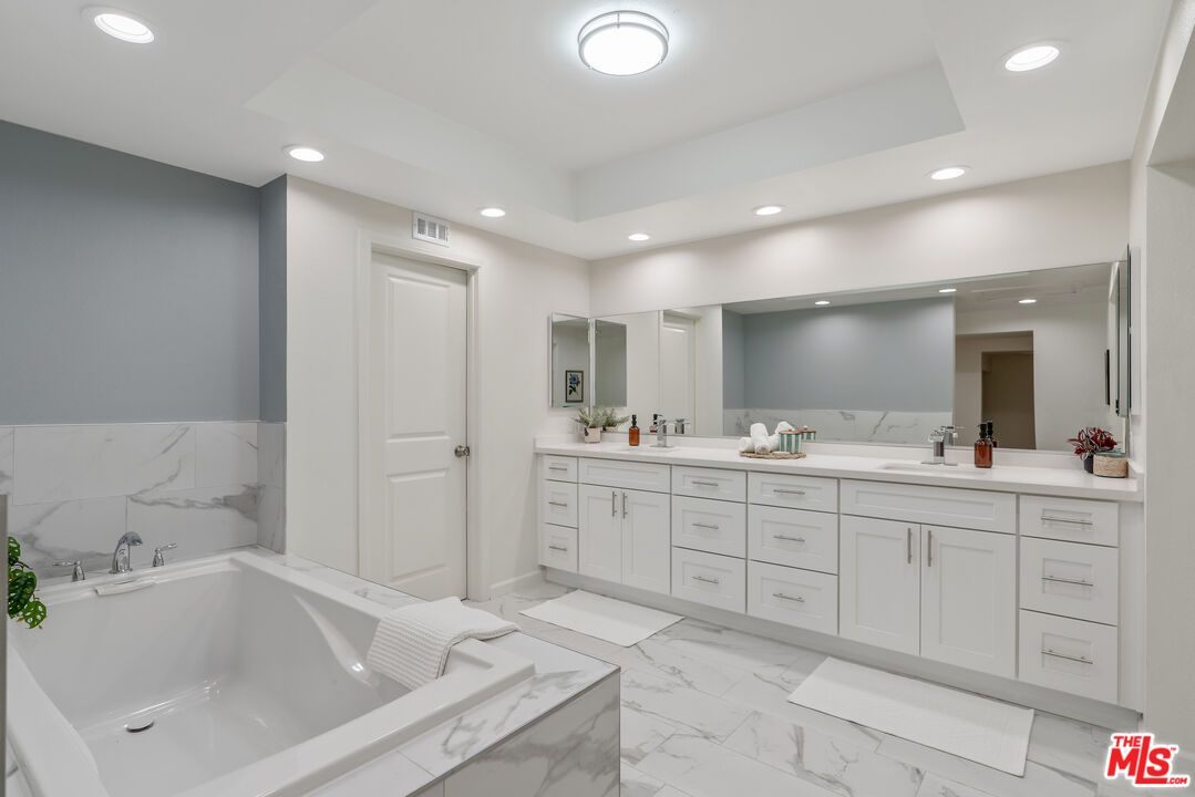 Bathroom, Dual Sink Vanities, Interior, Marble, Marble Walls, Recessed Lighting