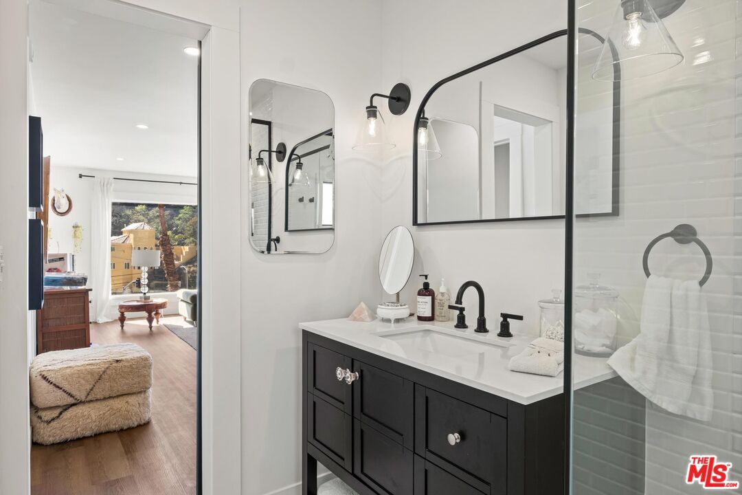 Bathroom, Dual Sink Vanities, Interior, Recessed Lighting, Wood Texture Flooring
