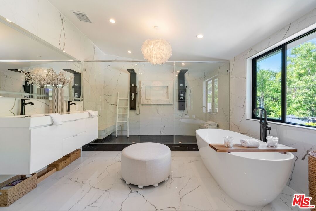 Bathroom, Chandelier, Free Standing Baths, Glass Shower, Interior, Marble, Marble Walls, Recessed Lighting