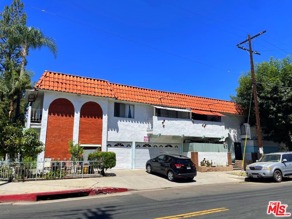 Attached, Exterior, Facade, Spanish Mediterranean