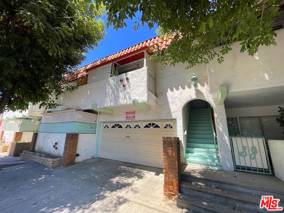 Attached, Exterior, Facade, Spanish Mediterranean