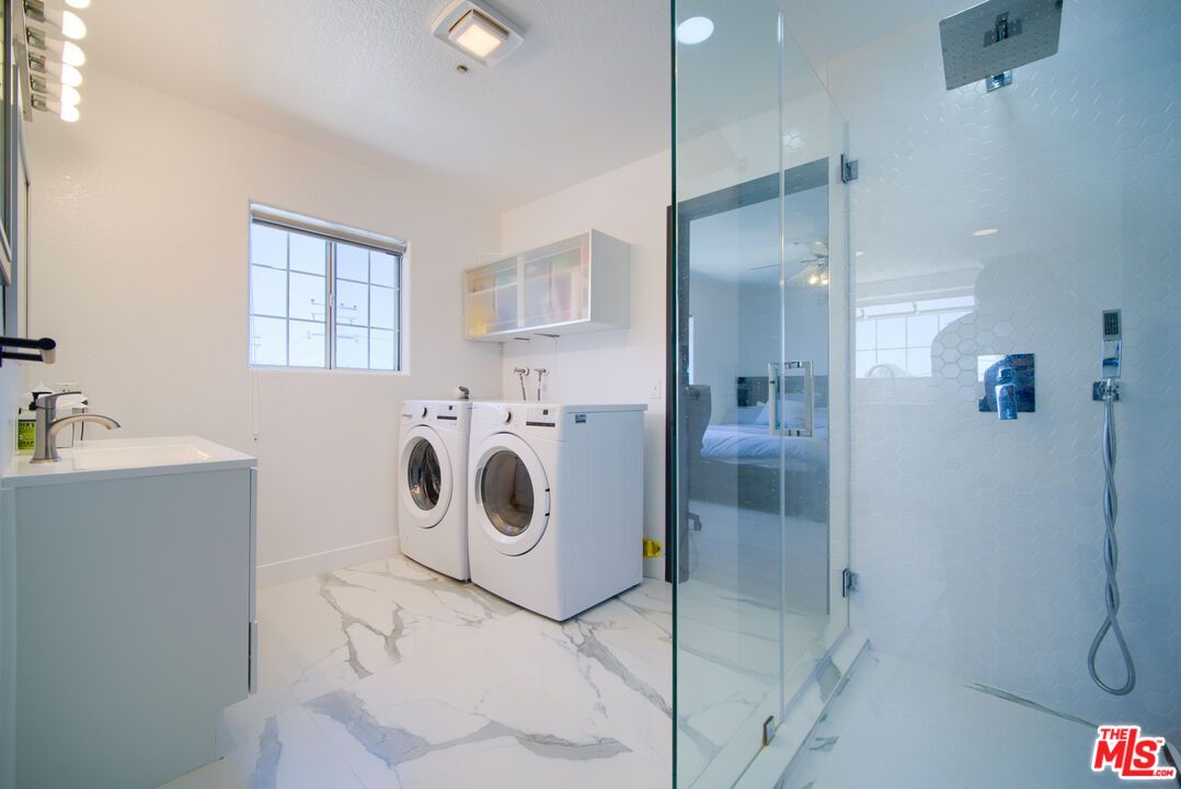 Bathroom, Dual Sink Vanities, Glass Shower, Interior, Marble, Recessed Lighting, Washer
