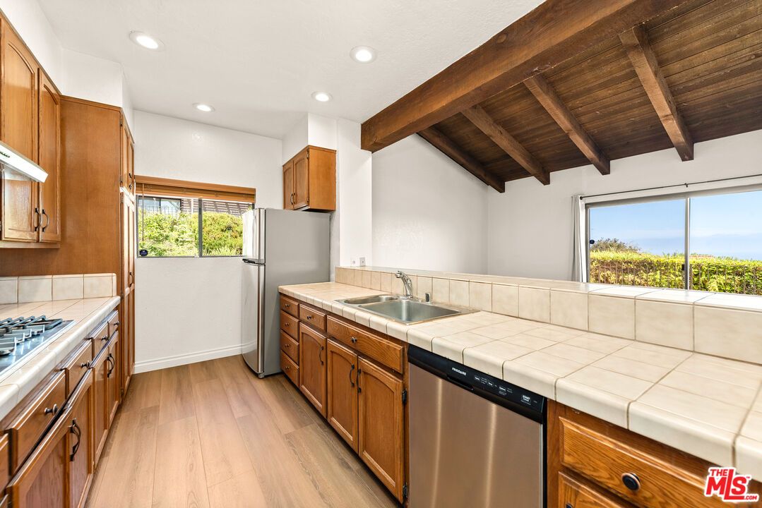 Interior, Kitchen, Recessed Lighting, Stainless Steel Appliances, Tile Countertops, Wooden Beams, Wooden Ceilings, Wood Texture Flooring