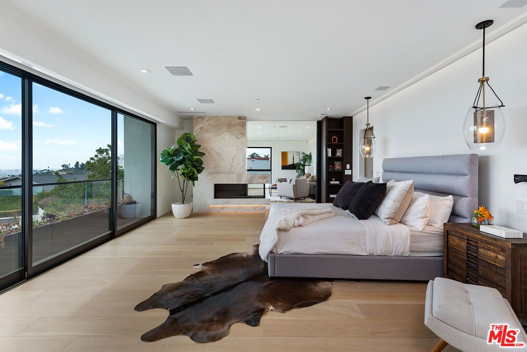 Bedroom, Fireplace, Interior, Pendant Lights, Recessed Lighting, Wood Texture Flooring