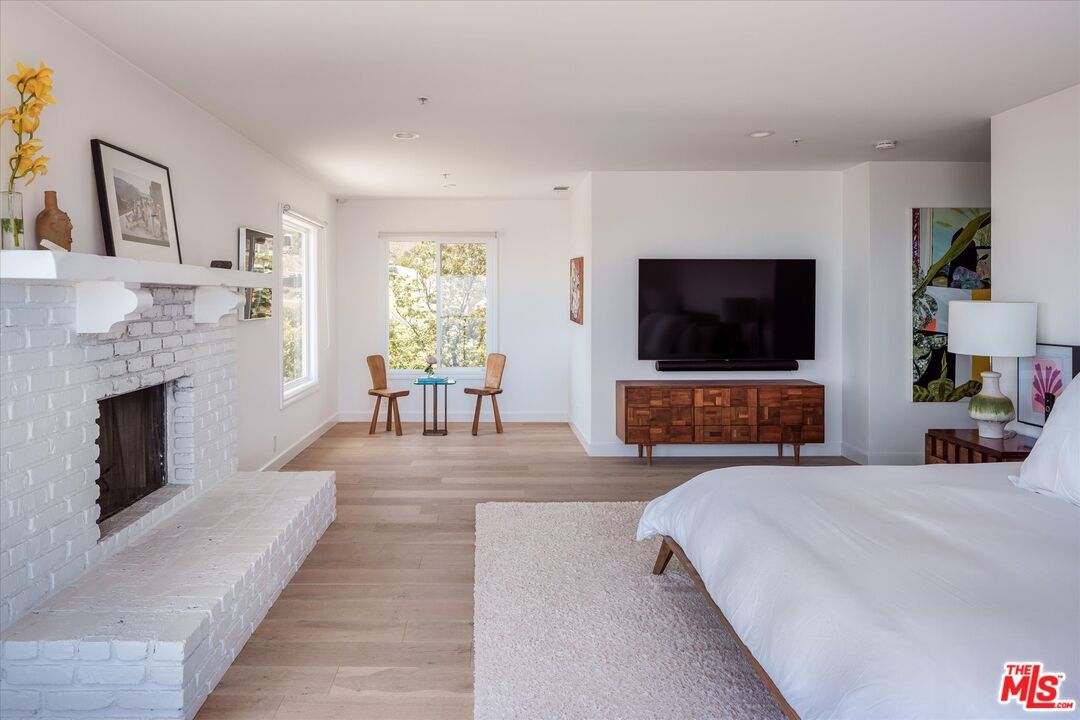 Bedroom, Fireplace, Interior, Recessed Lighting, Wood Texture Flooring