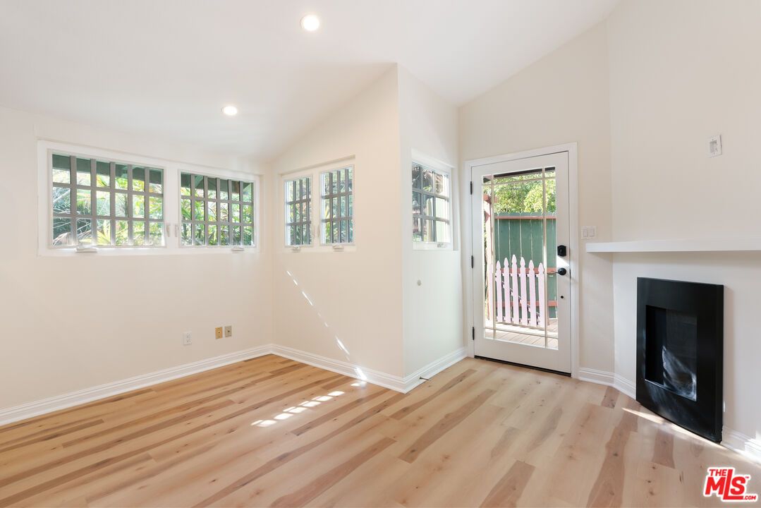 Empty room, Fireplace, Interior, Recessed Lighting, Wood Texture Flooring